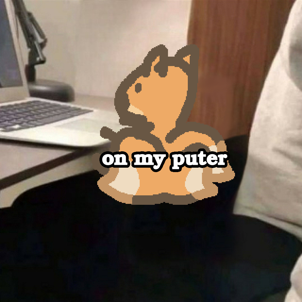 a three tailed fox sitting by a lap top with its paws on it, text reads "on my puter"